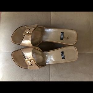 Stuart Weitzman cork platform wedges in gold